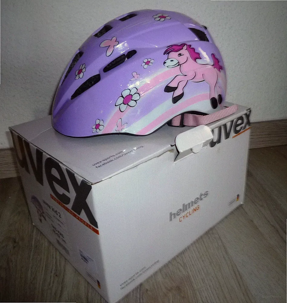 neuer UVEX Kinder Fahrradhelm Mädchen Pony in Lila Pink Rosa mit original Karton