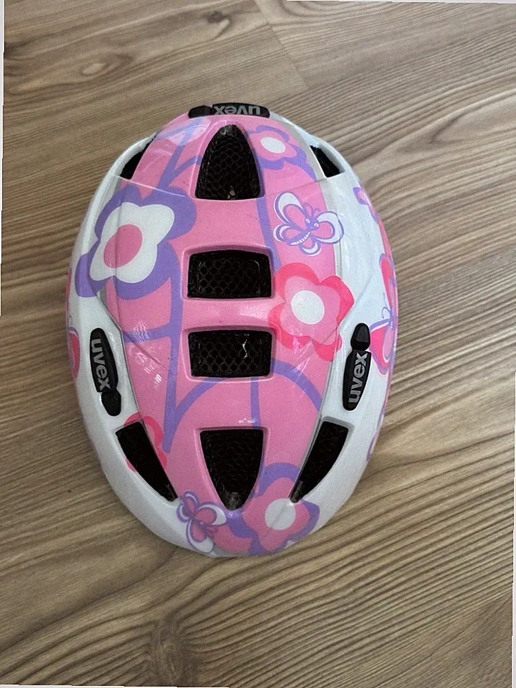 Uvex Kinderfahrradhelm pink-weiß, Größe 46-52, unfallfrei Fahrrad
